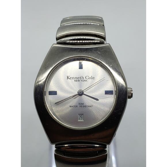 Kenneth Cole KC4145 women's watch. Calendar date on face. Silver on silver face